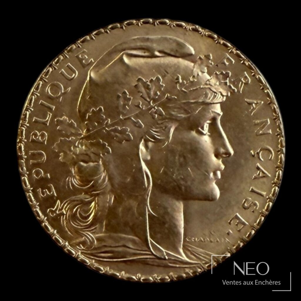 Avers d'une pièce 20 francs Marianne au coq de 1907.