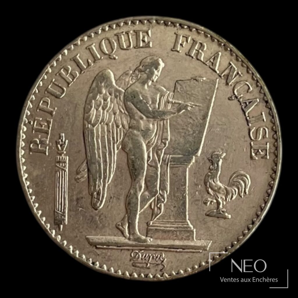 Face d'une pièce de 20 francs en or Génie ailé avec le Génie debout et la légende République française