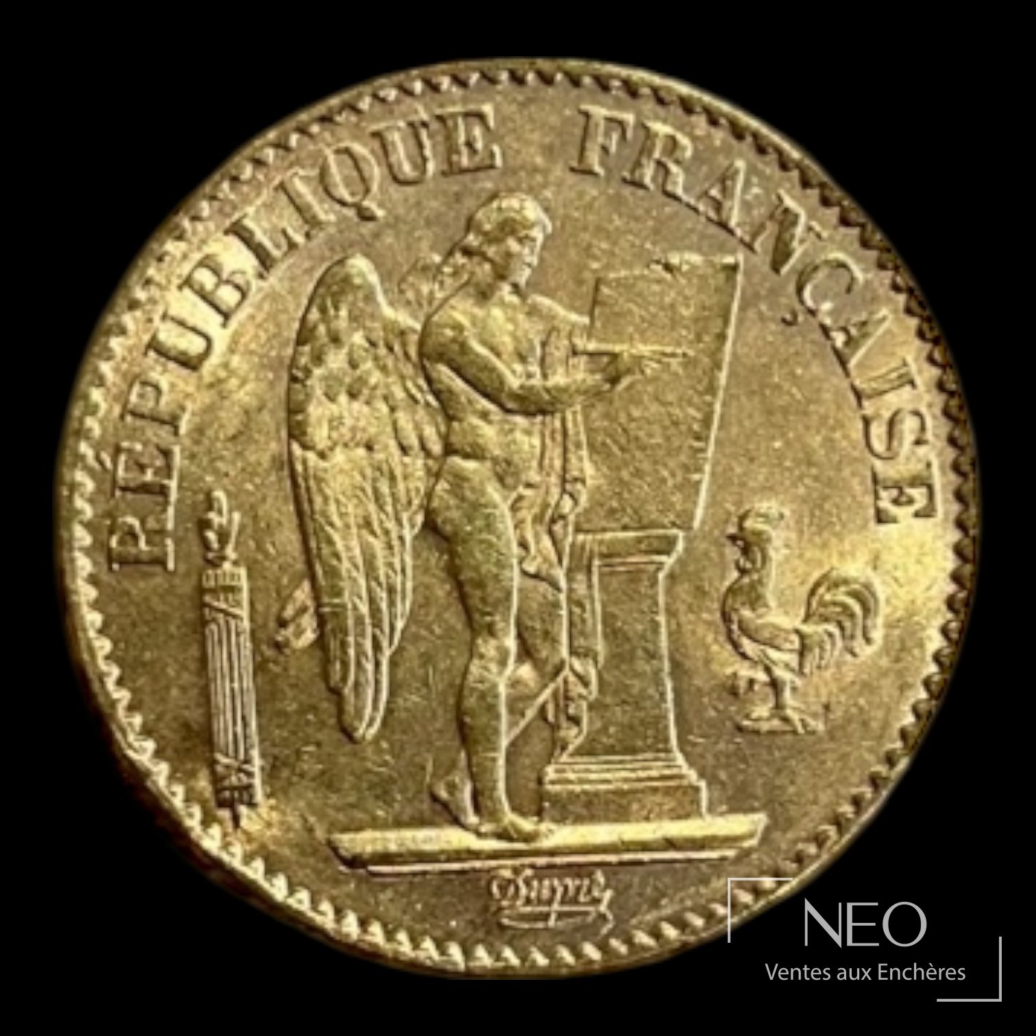 Face d’une pièce de 20 francs en or Génie ailé avec la légende République française.