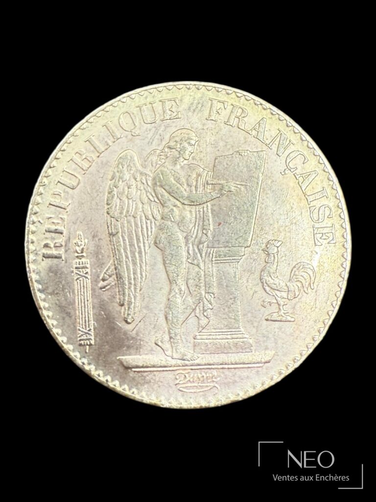 Avers d'une pièce de 20 francs or Génie ailé avec l'inscription REPUBLIQUE FRANCAISE.