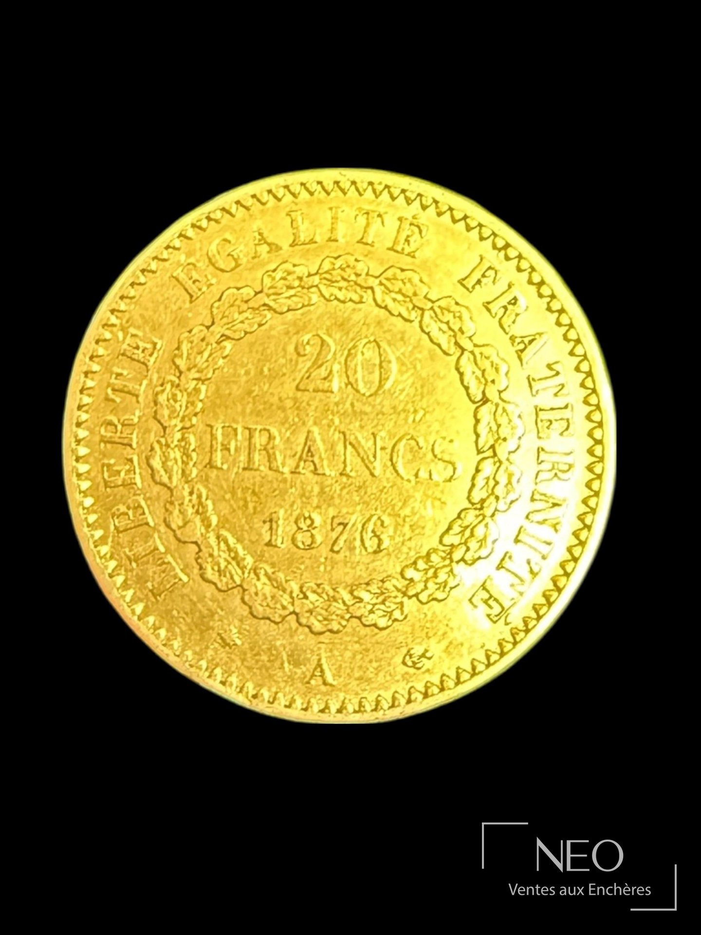Avers d'une pièce de 20 francs or portant l'inscription République française et le millésime 1876