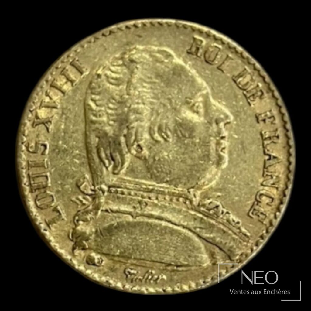Avers d’une pièce de 20 francs or Louis XVIII tête nue.