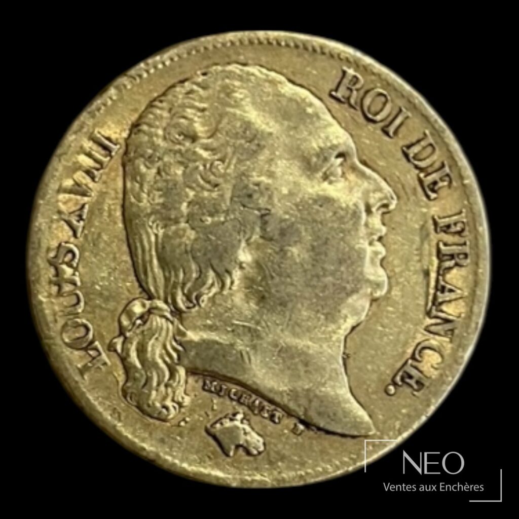 Avers d’une pièce de 20 francs or Louis XVIII tête nue