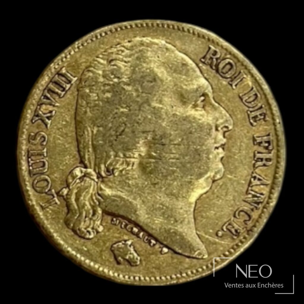 Avers d'une pièce de 20 francs or Louis XVIII tête nue avec le portrait du roi.