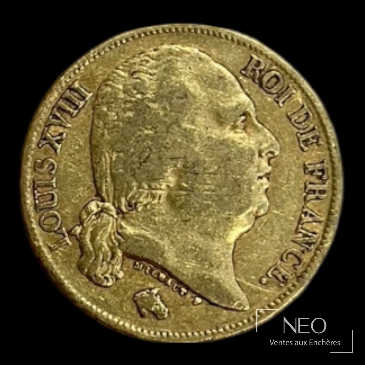 Avers d'une pièce de 20 francs or Louis XVIII tête nue avec le portrait du roi.