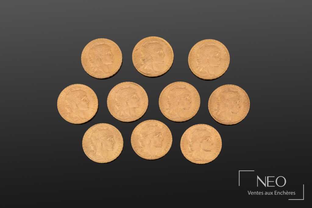 Dix pièces de 20 francs or Marianne au coq présentées de face