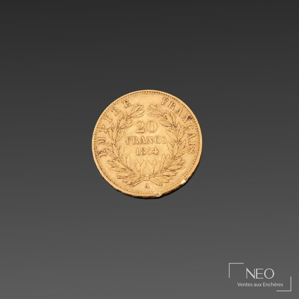 Revers d'une pièce de 20 francs or avec la valeur 20 francs et la date 1854