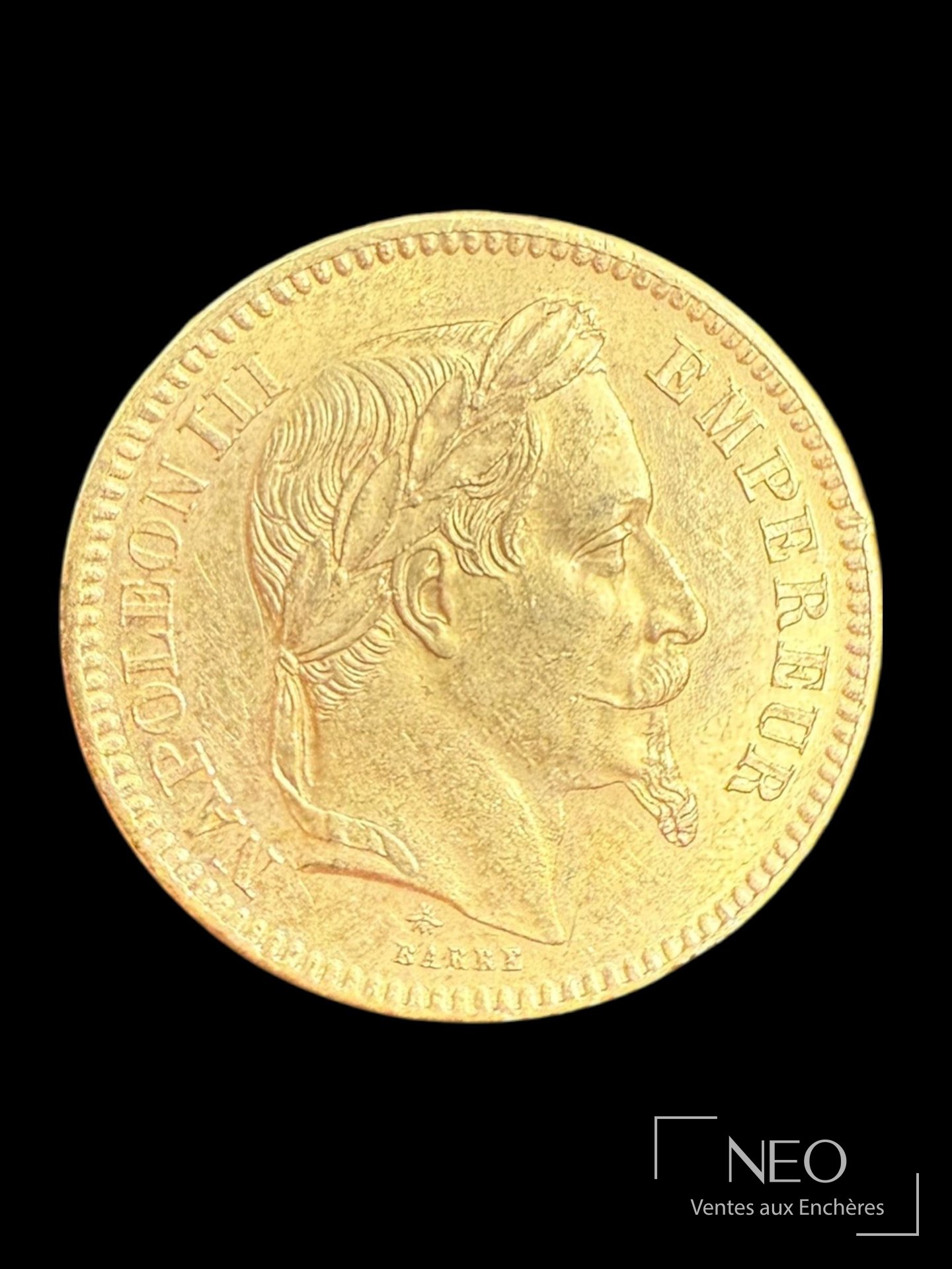 Avers d'une pièce de 20 francs or Napoléon III tête laurée