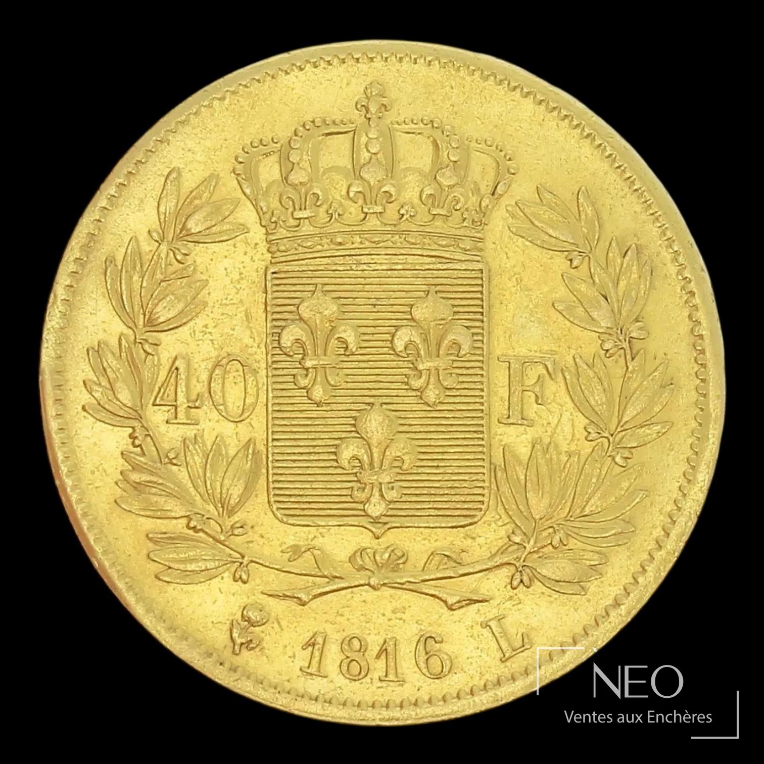 Avers d'une pièce de 40 francs or Louis XVIII avec buste du roi et légende circulaire
