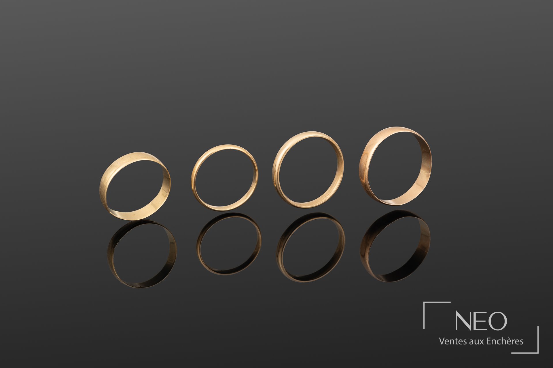 Lot de 4 alliances en or jaune et rose 18K