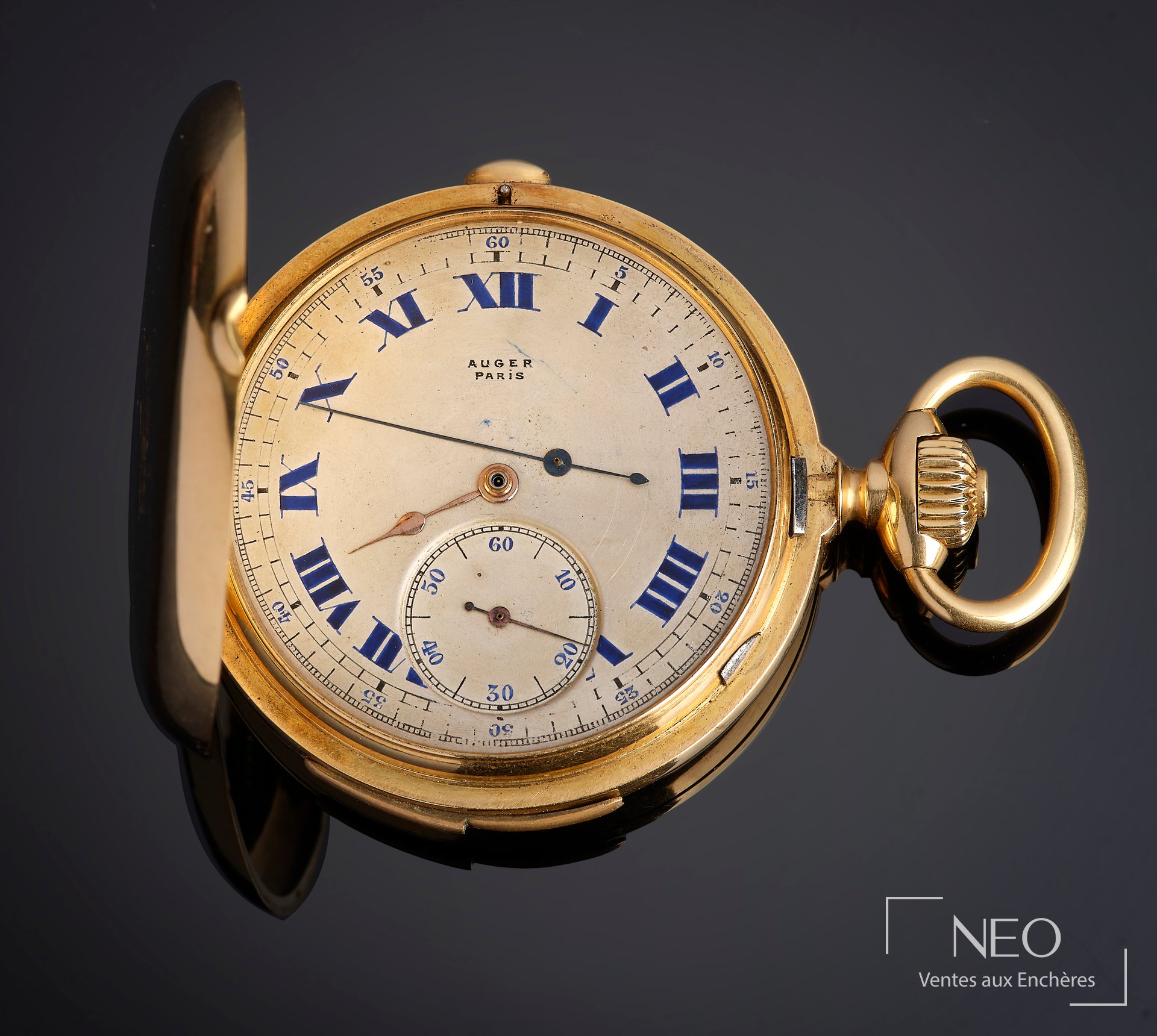 Montre de poche savonnette en or jaune avec cadran signé AUGER PARIS