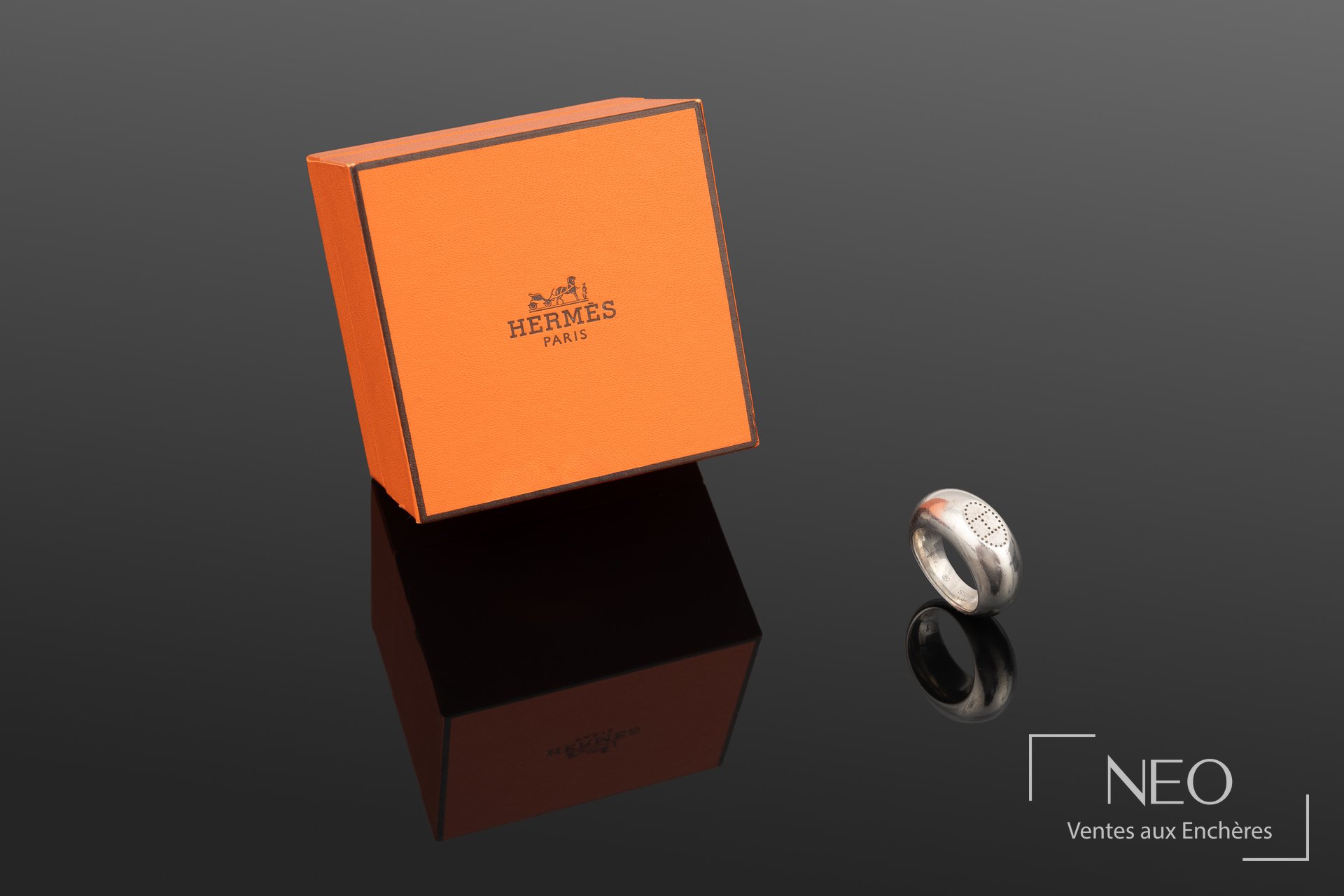 Hermès bague en argent 925/1000 décorée d’un H perforé