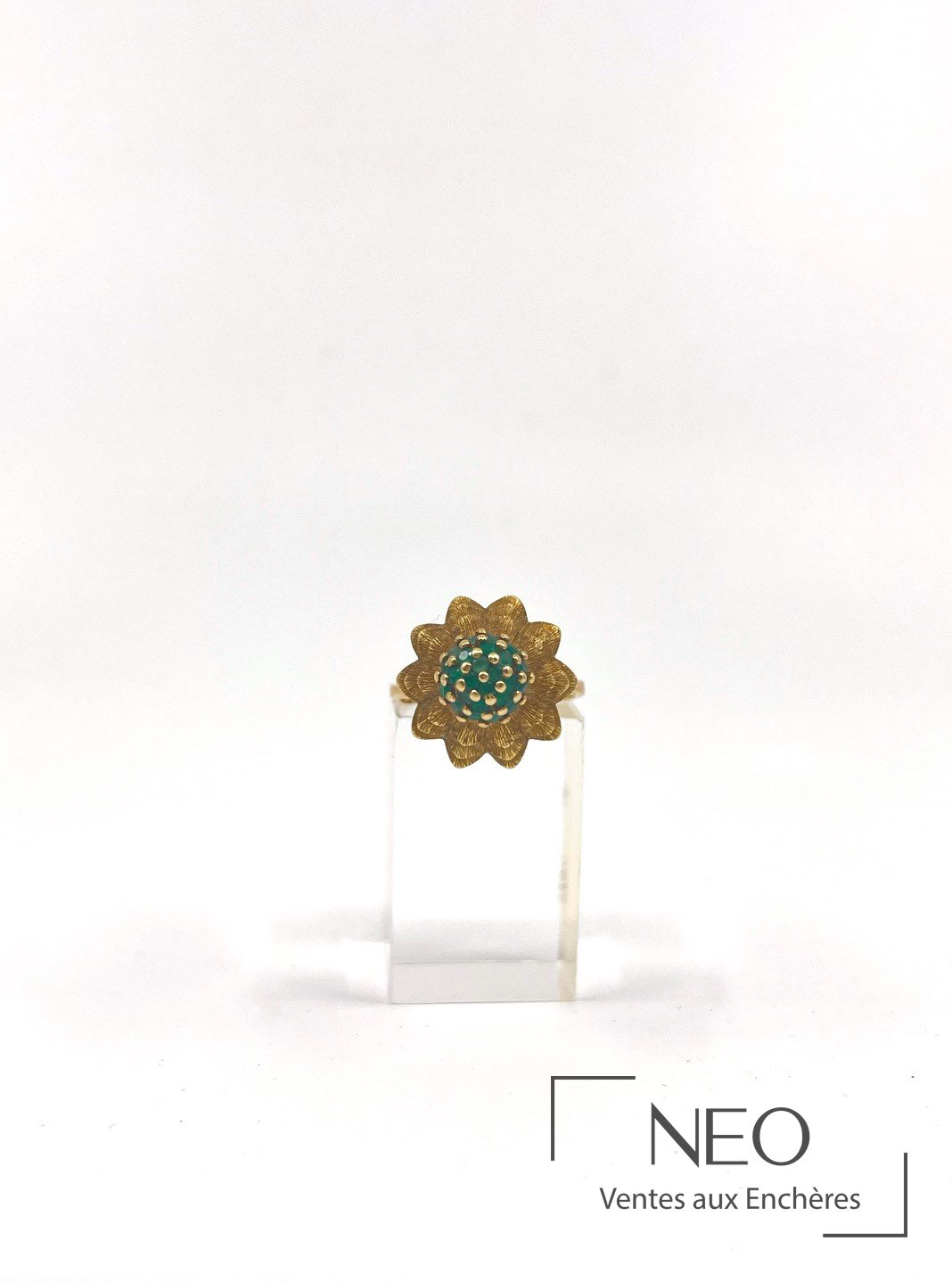 Bague conique en or jaune 18 carats et émeraudes