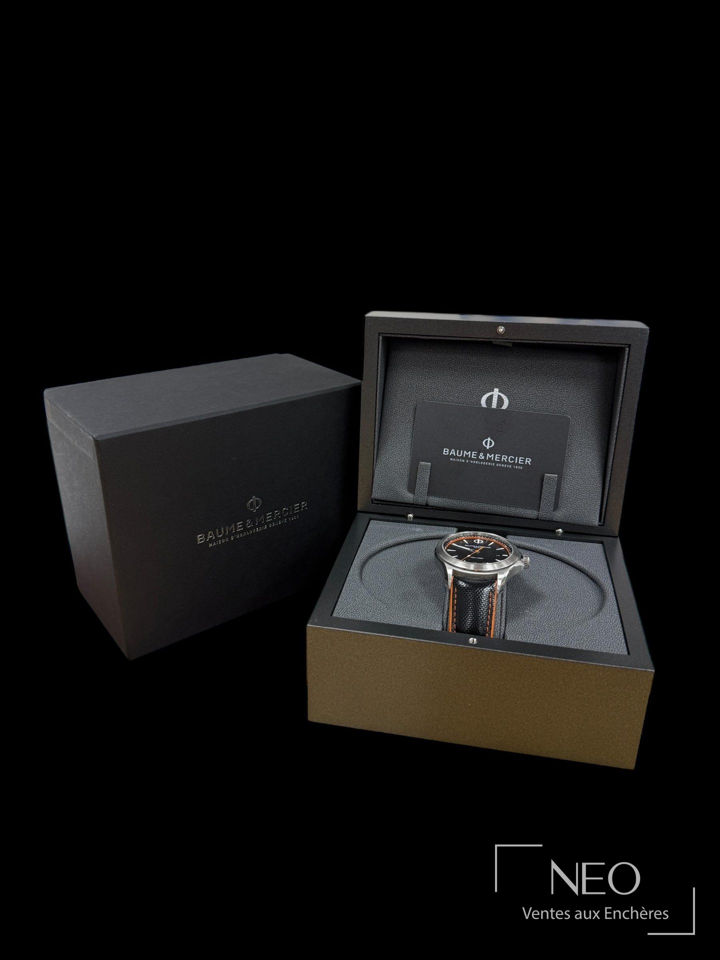 Montre Baume & Mercier Clifton Club présentée dans son écrin avec boîte et documents