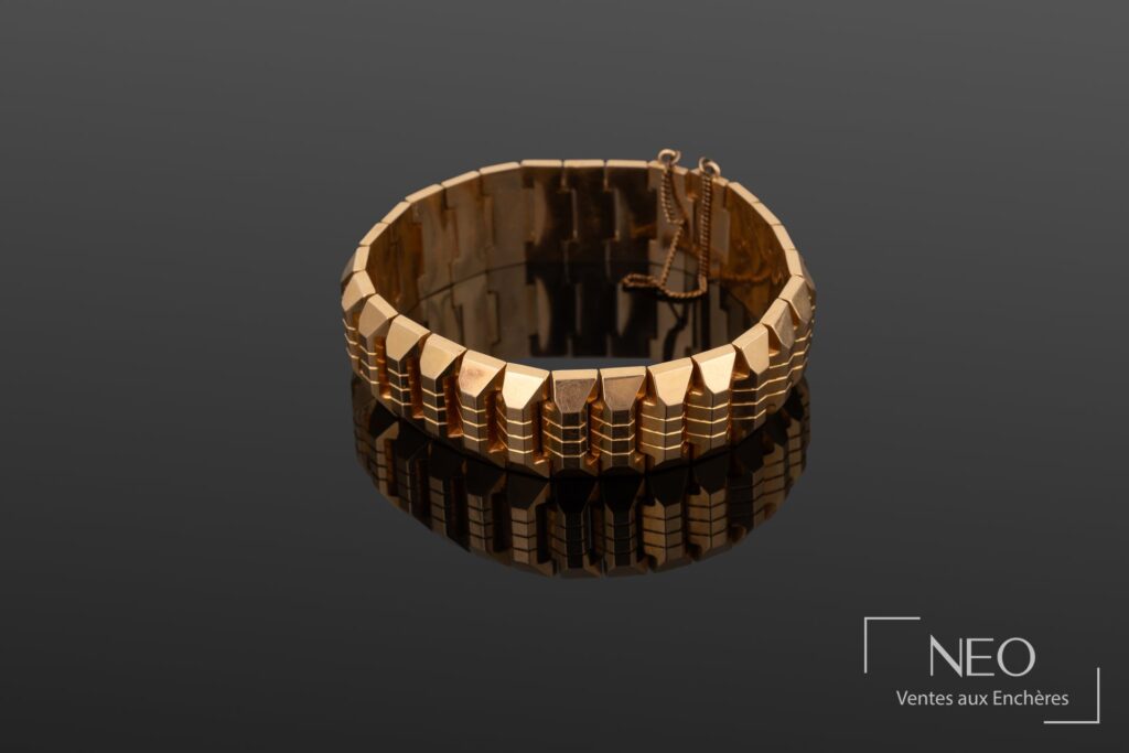 Bracelet articulé en or jaune 18 carats de style tank