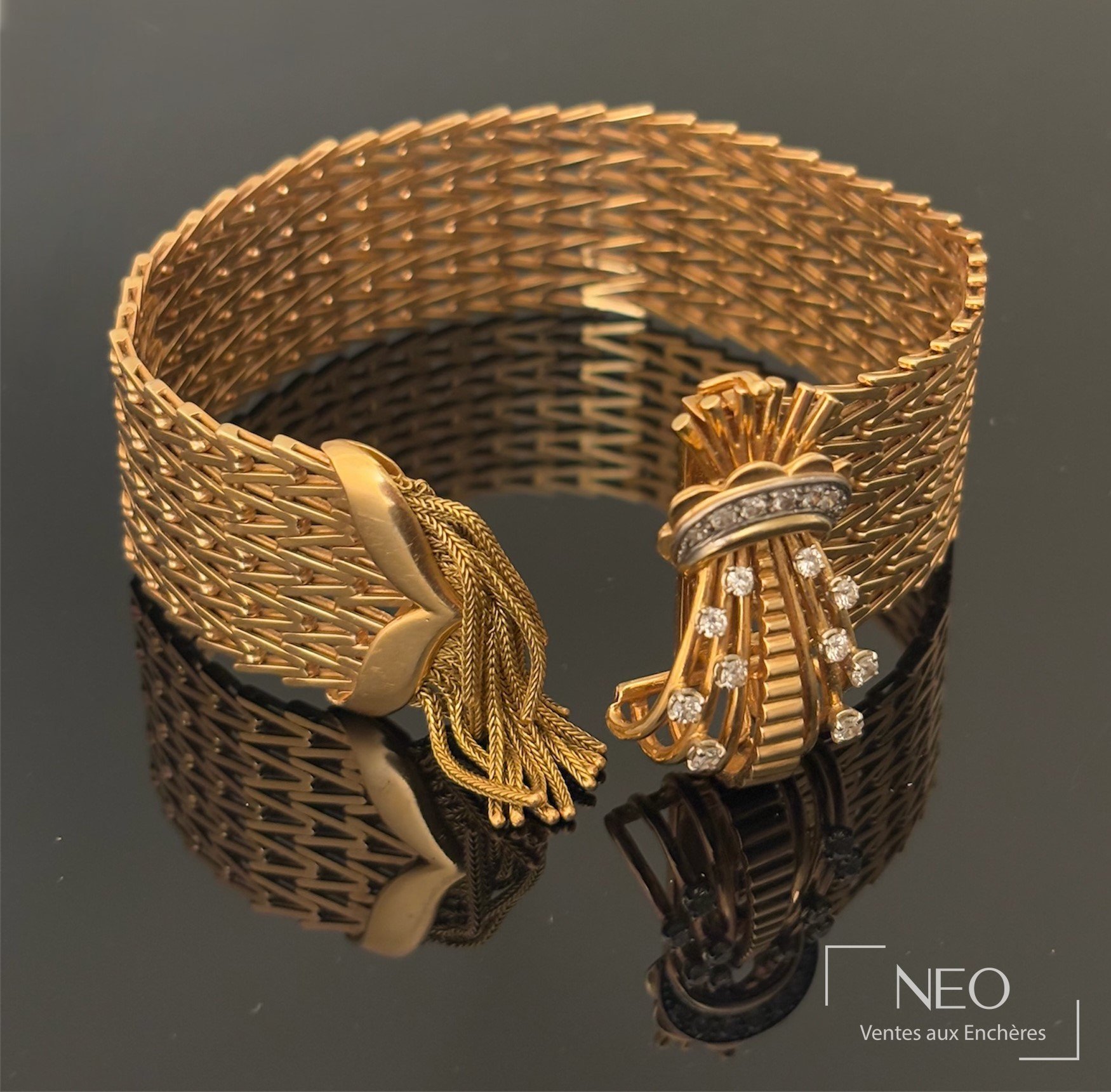 Bracelet articulé en or rose et or jaune avec fermoir orné de diamants