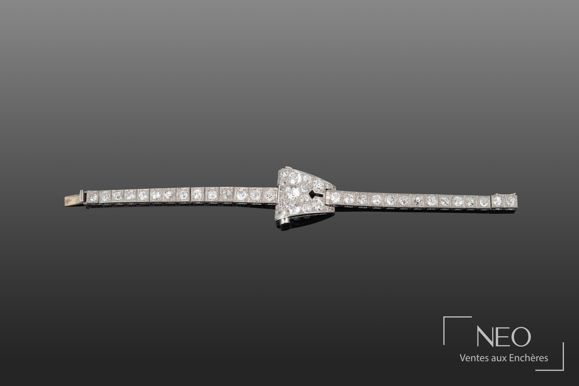 Bracelet articulé en platine pavé de diamants