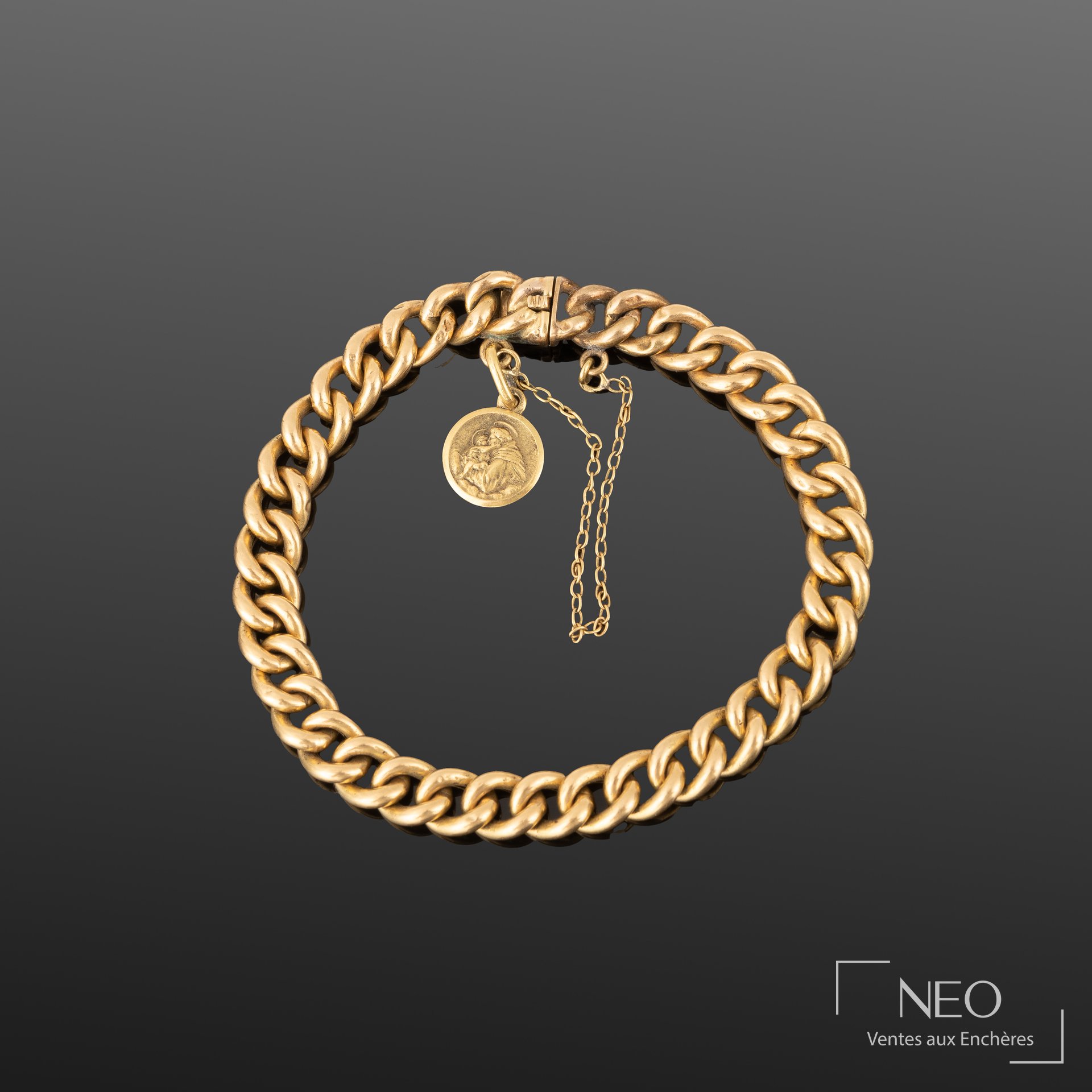 Bracelet d'enfant en or jaune à maille gourmette avec médaille ronde
