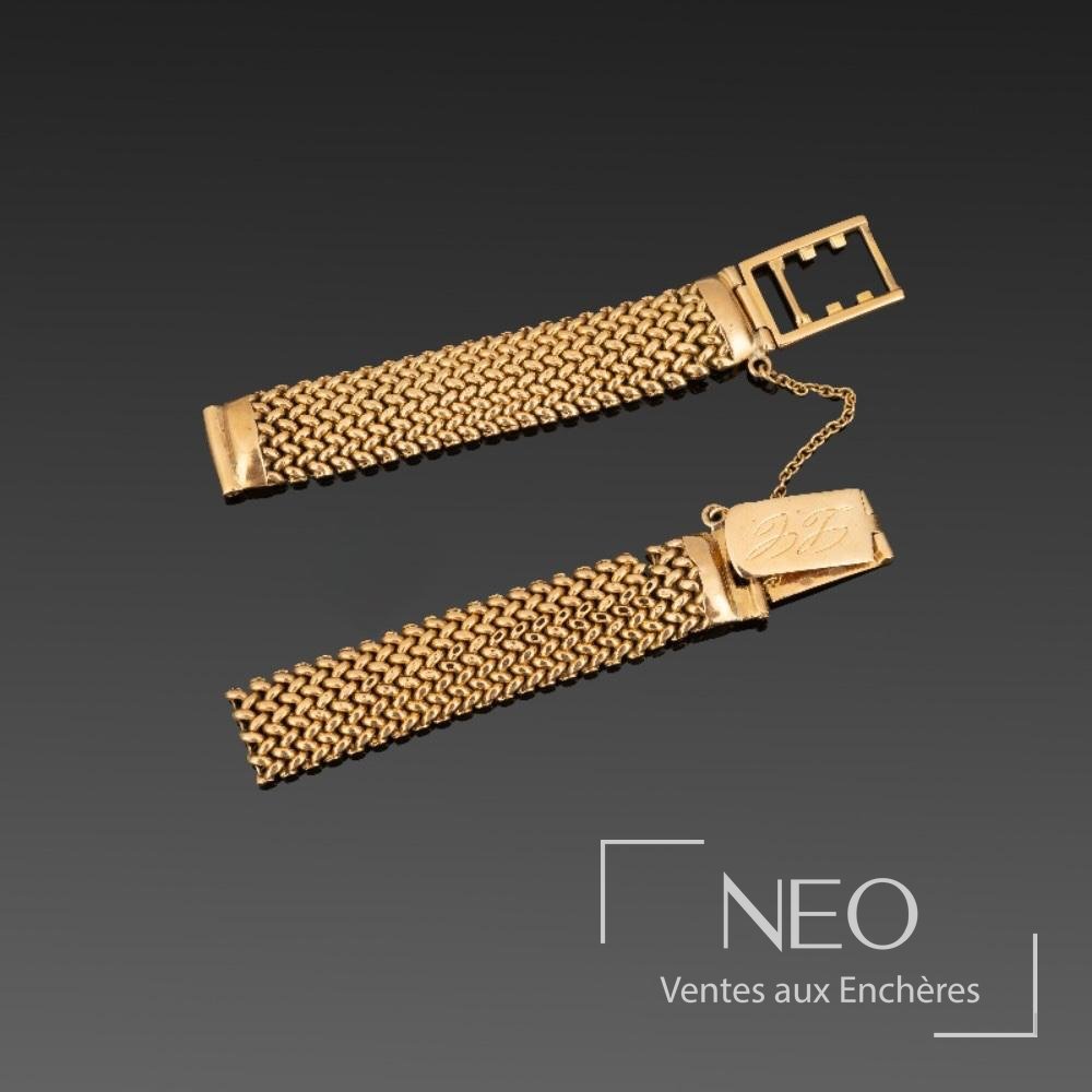 Bracelet de montre en or jaune à maille chevron avec fermoir et chaînette de sécurité
