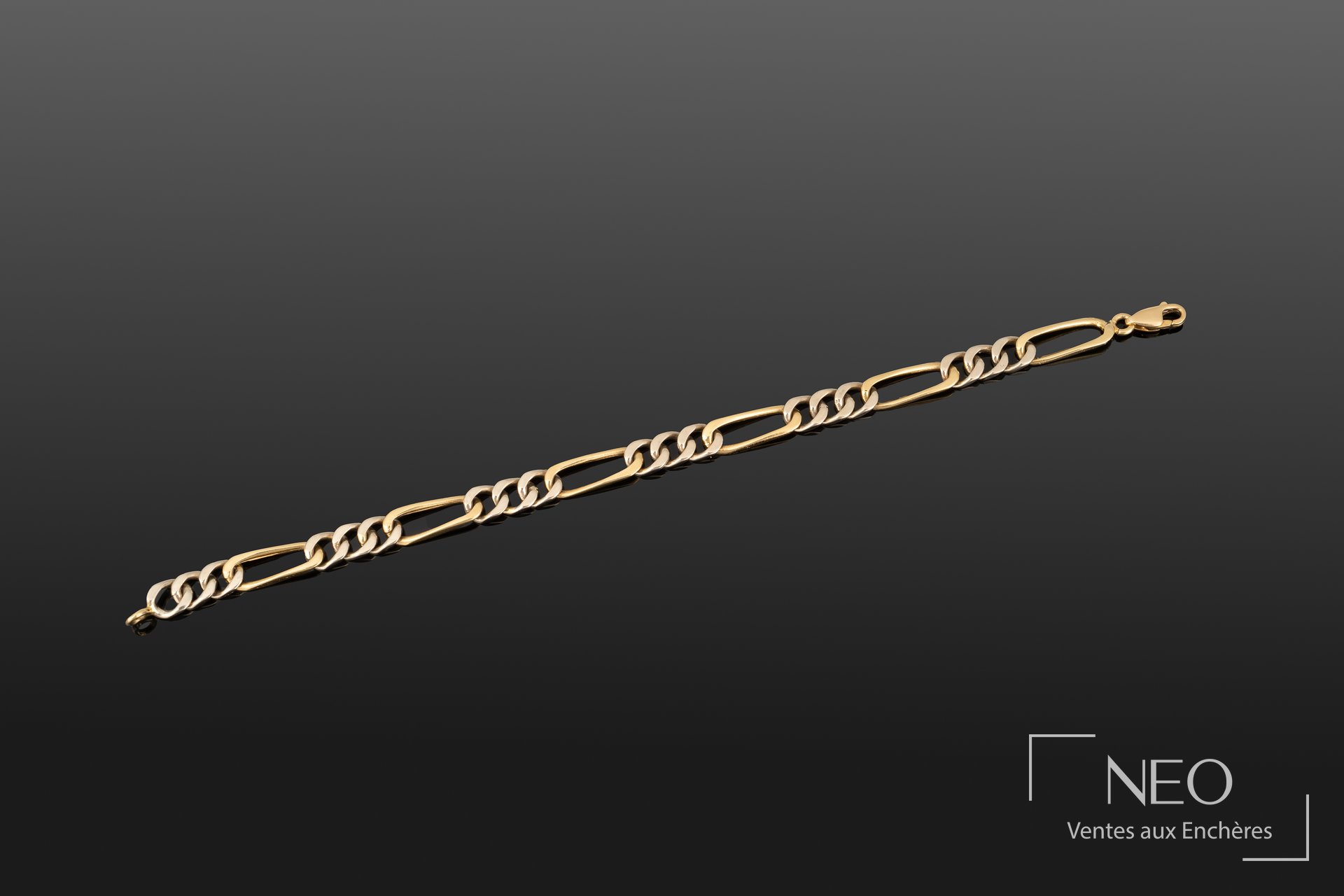 Bracelet gourmette en or jaune et gris 18K, fermoir mousqueton