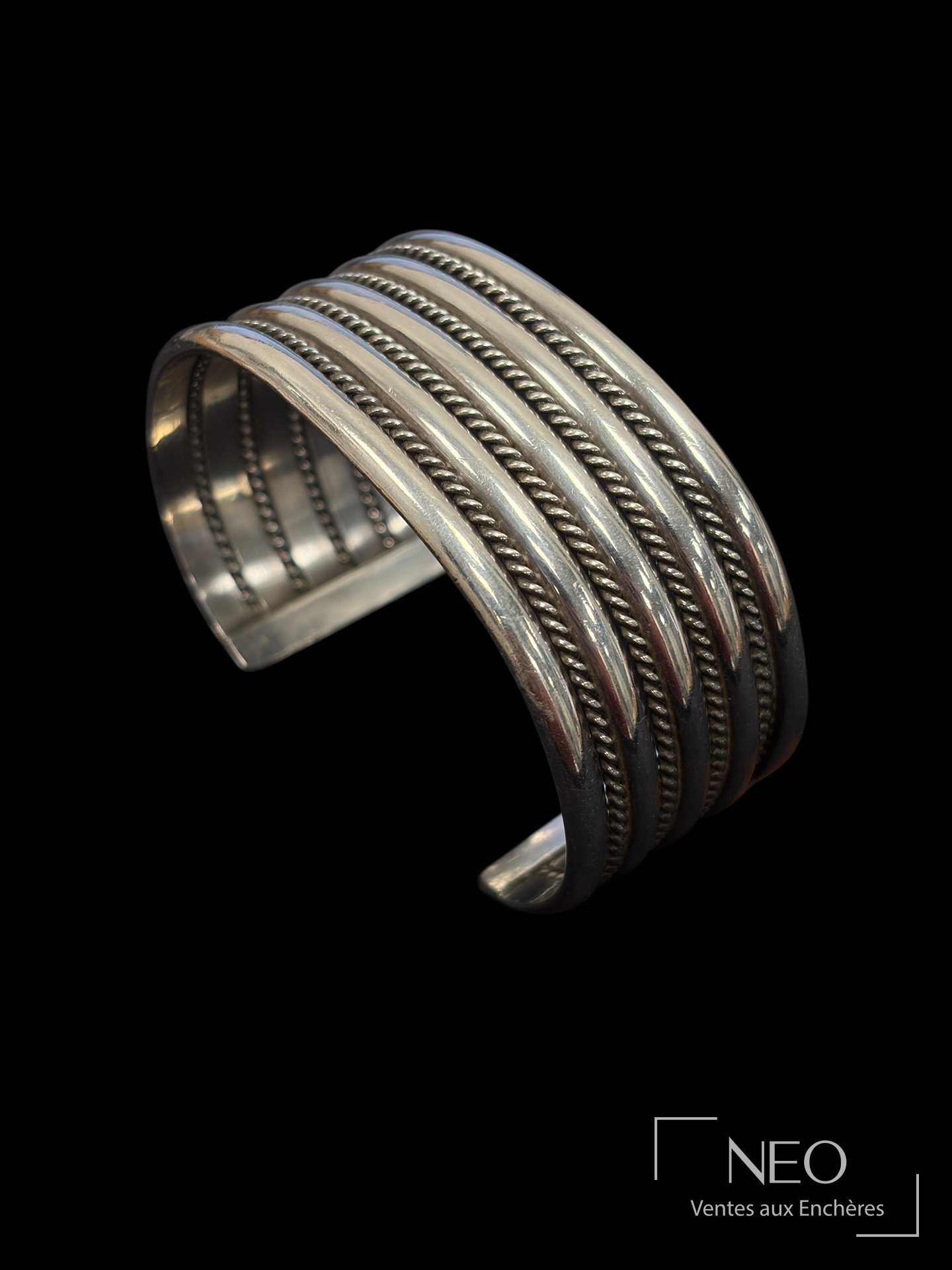 Bracelet jonc ouvert en argent à liens torsadés