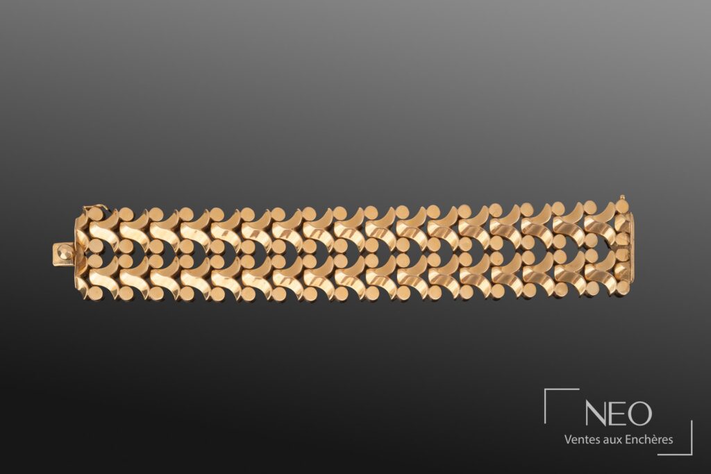 Bracelet en or jaune à mailles articulées fantaisie