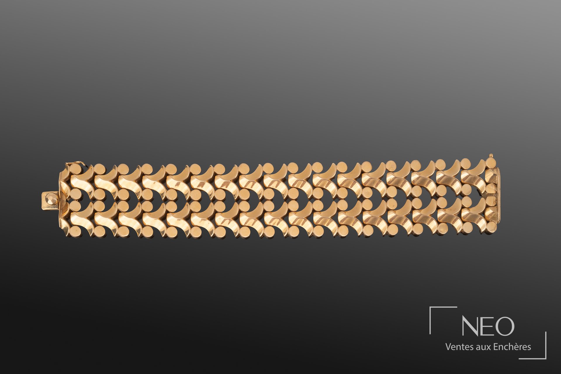 Bracelet en or jaune 18K à mailles articulées fantaisie