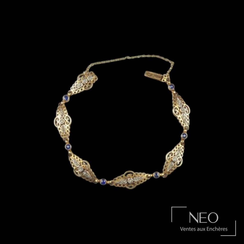 Bracelet en or jaune et platine avec maillons ajourés