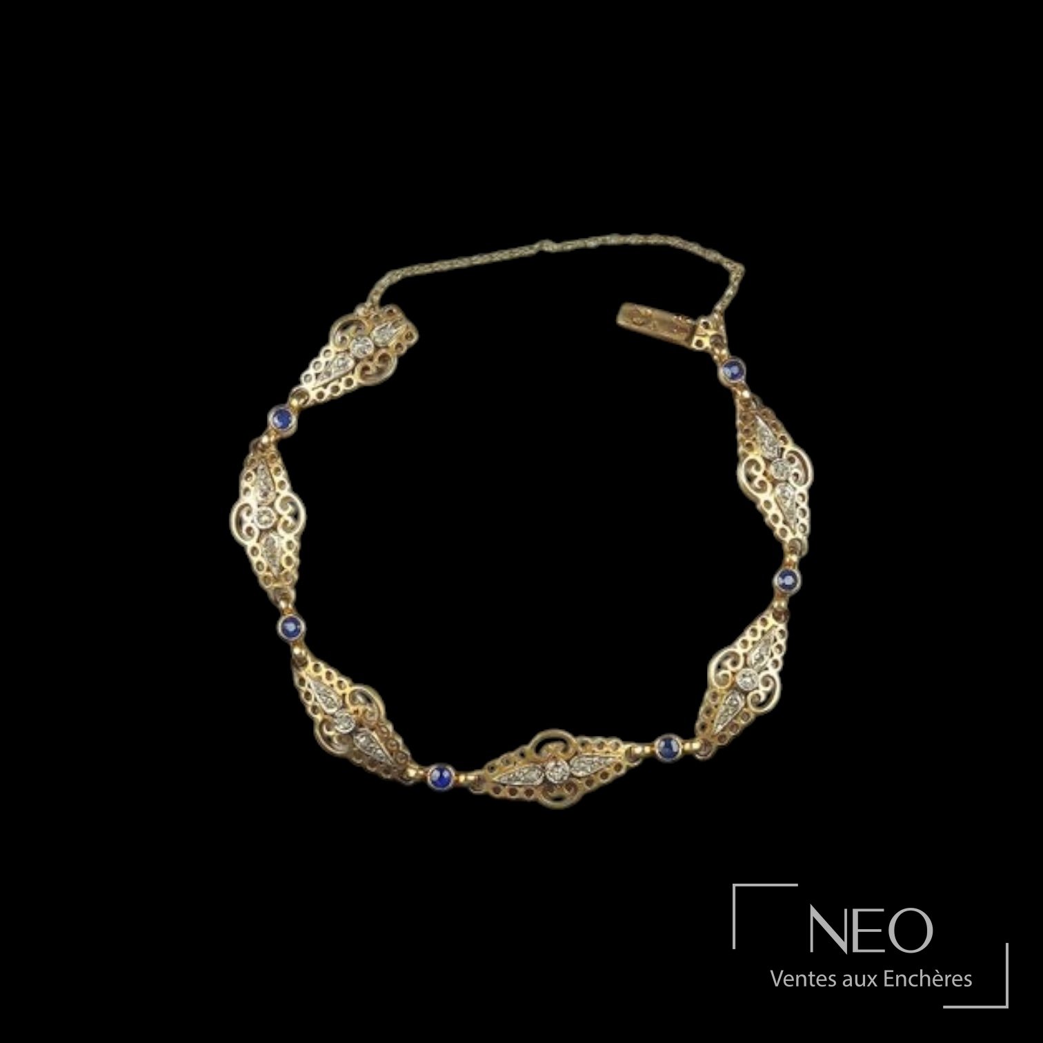 Bracelet en or jaune et platine avec maillons ajourés
