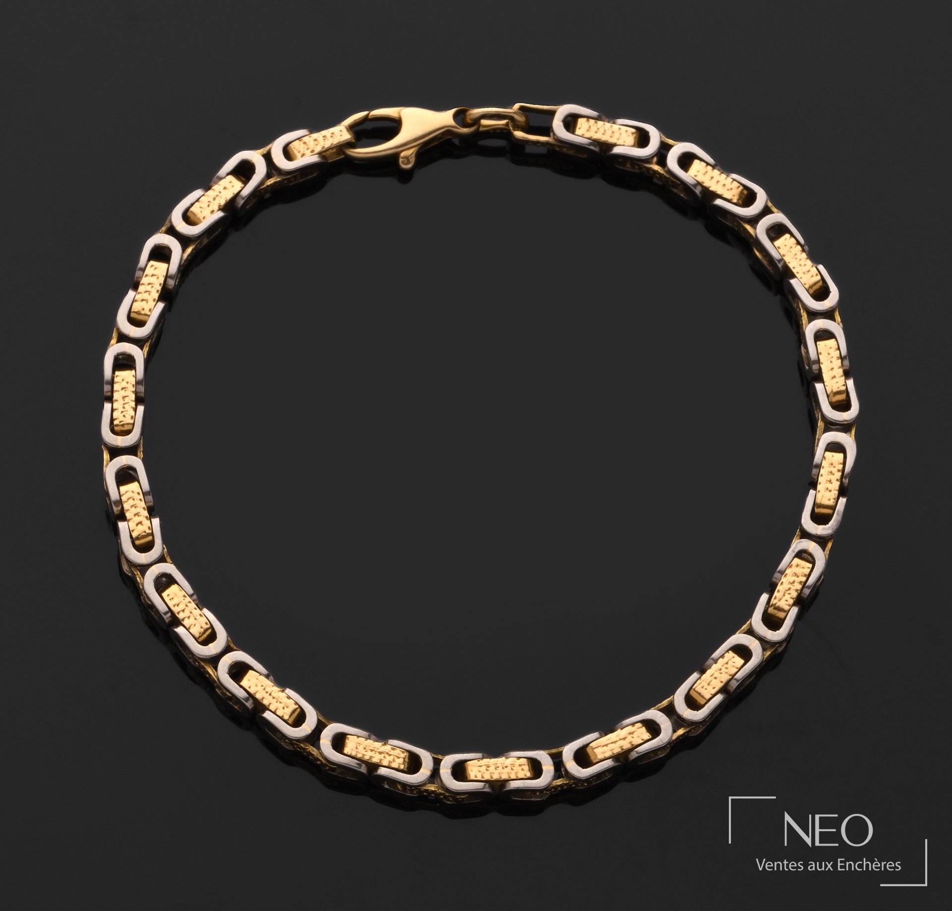Bracelet en ors jaune et gris 18 carats à mailles fantaisies alternées