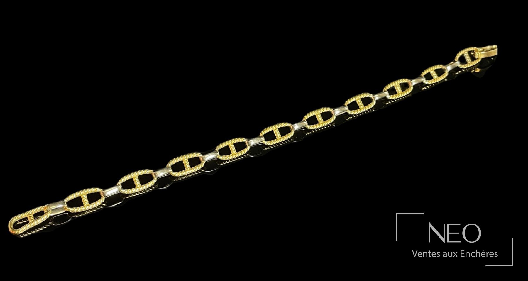 Bracelet en ors jaune et gris 18 carats à mailles marine