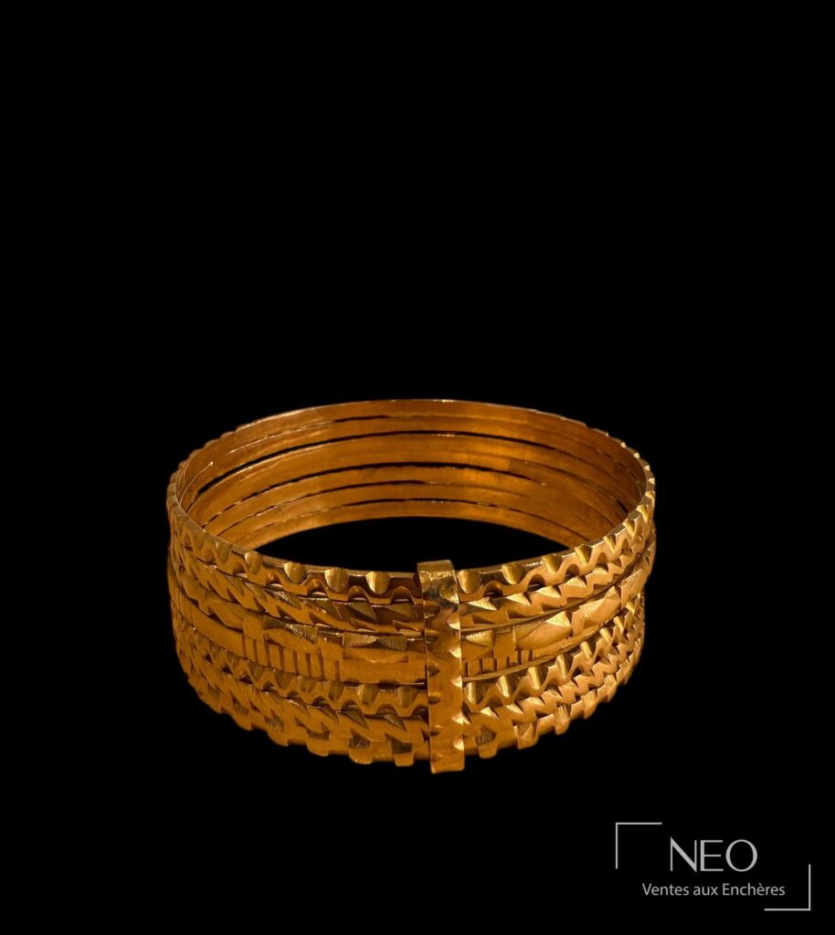 Bracelet semainier en or rose à motifs géométriques