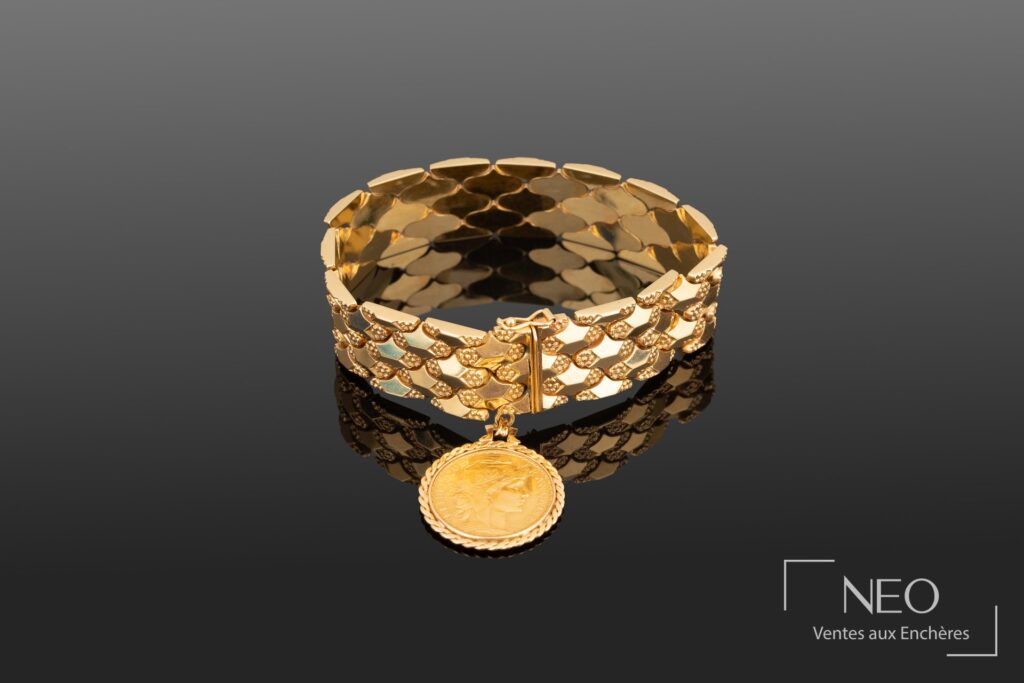 Bracelet souple en or jaune avec pièce de 20 francs or suspendue