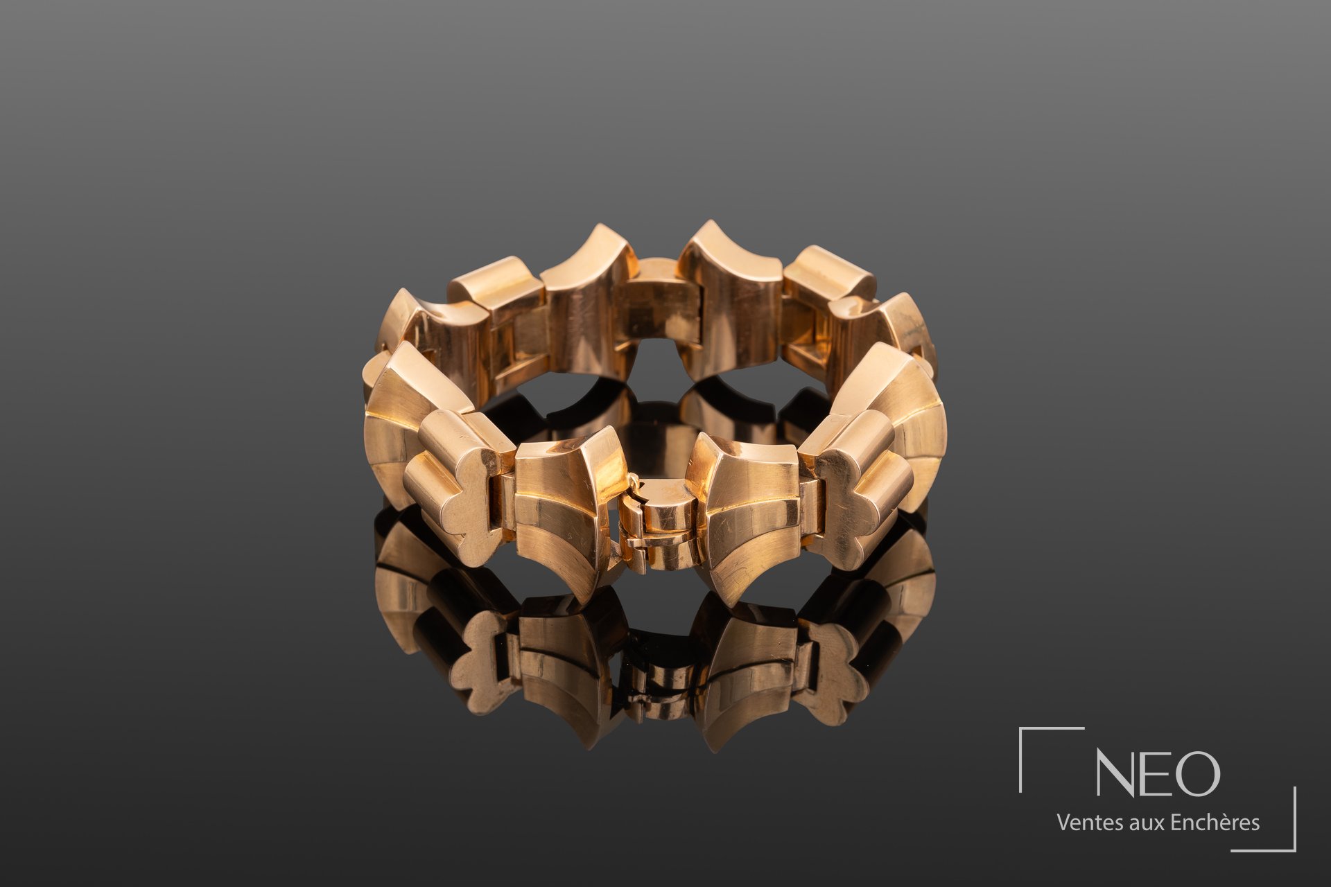 Bracelet de style tank en or jaune à maillons articulés