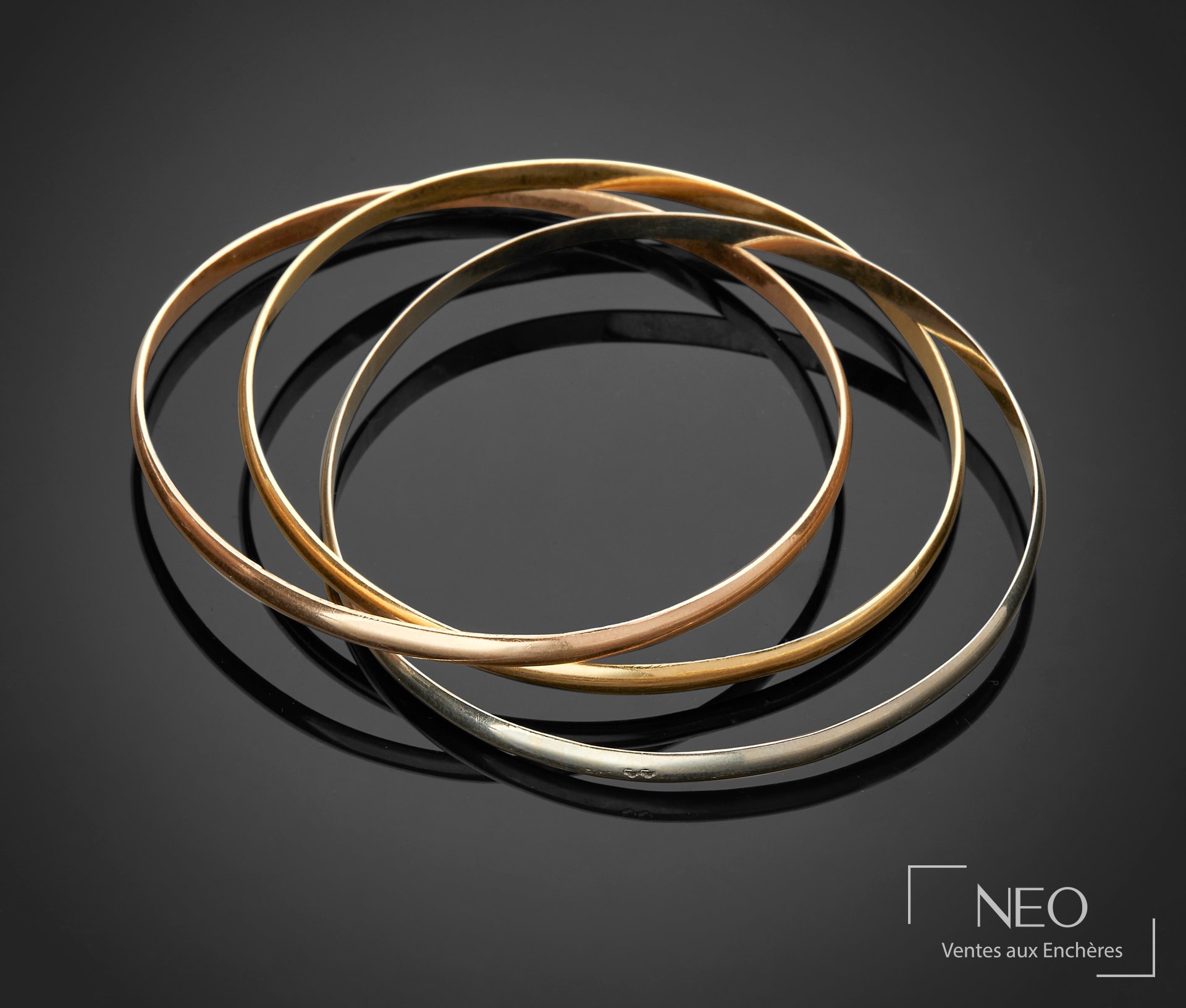 Bracelet formé de trois joncs en or 18 carats