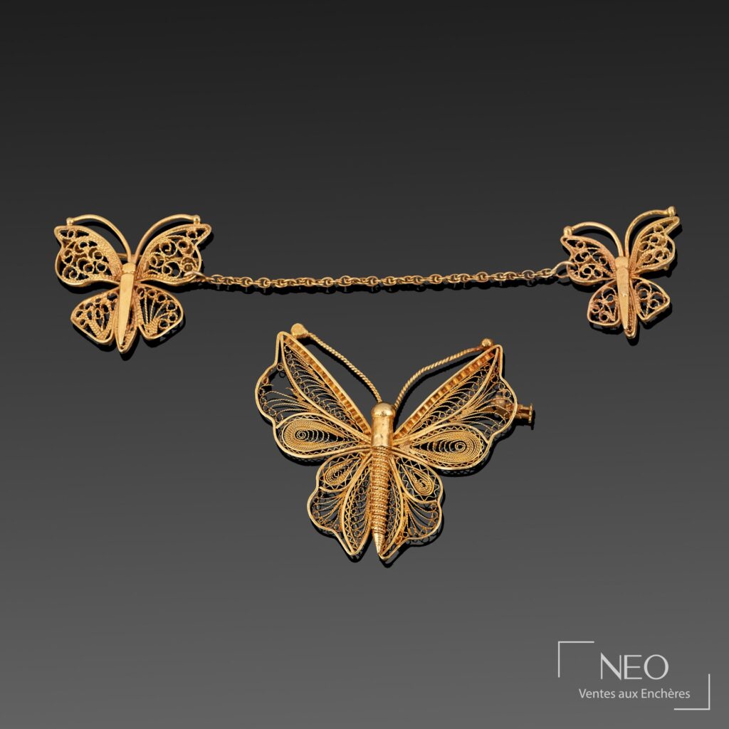 Lot de deux broches papillon en or jaune 18K