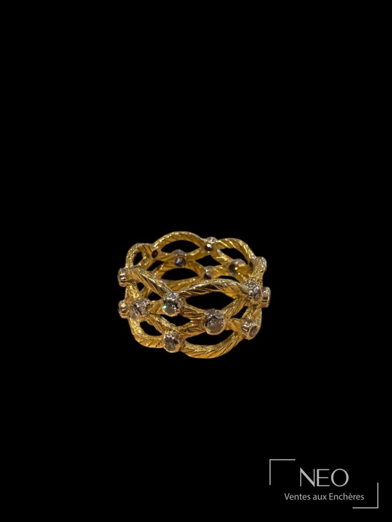 Bague bandeau Buccellati ajourée en or jaune et gris avec diamants