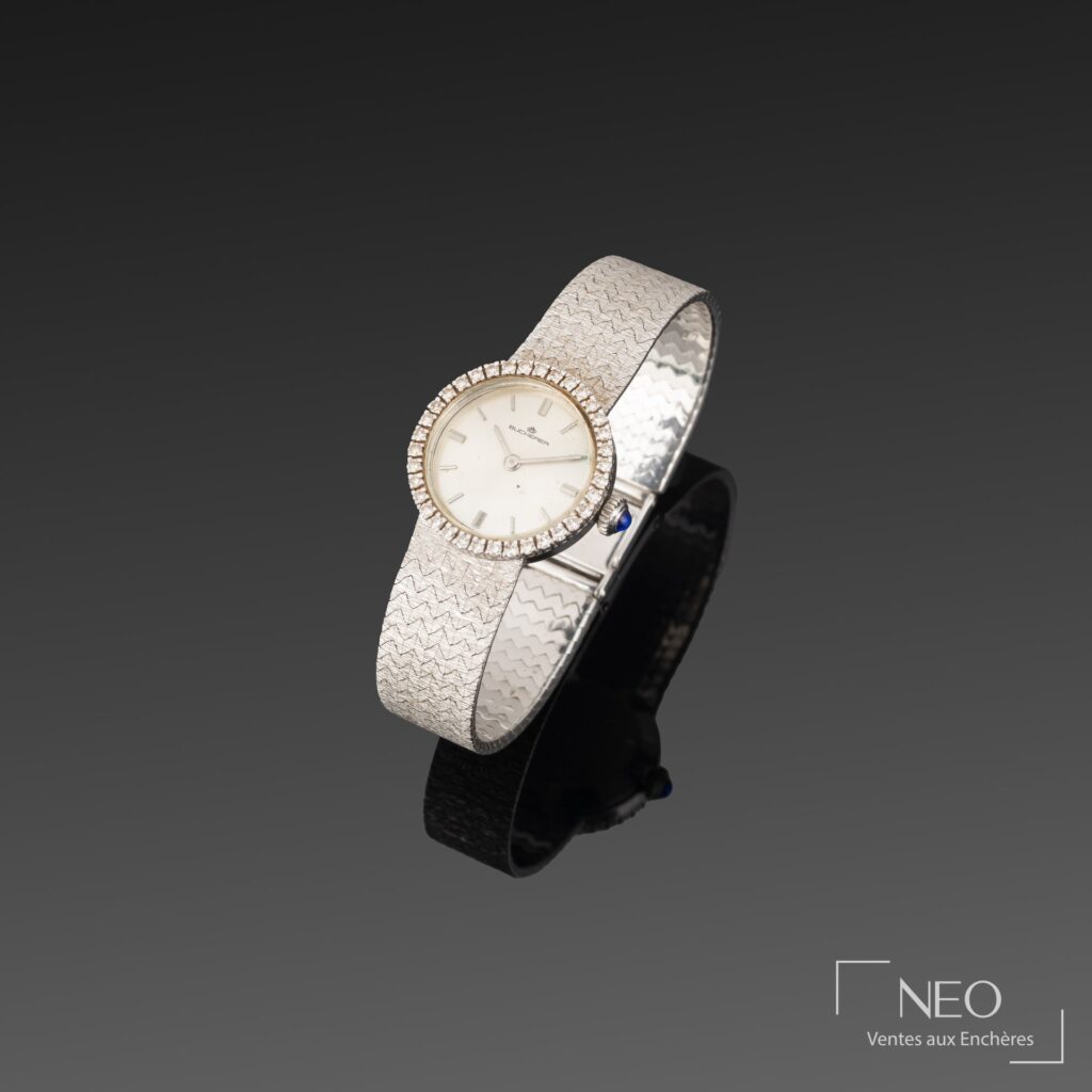 Montre bracelet Bucherer ronde en or gris et diamants
