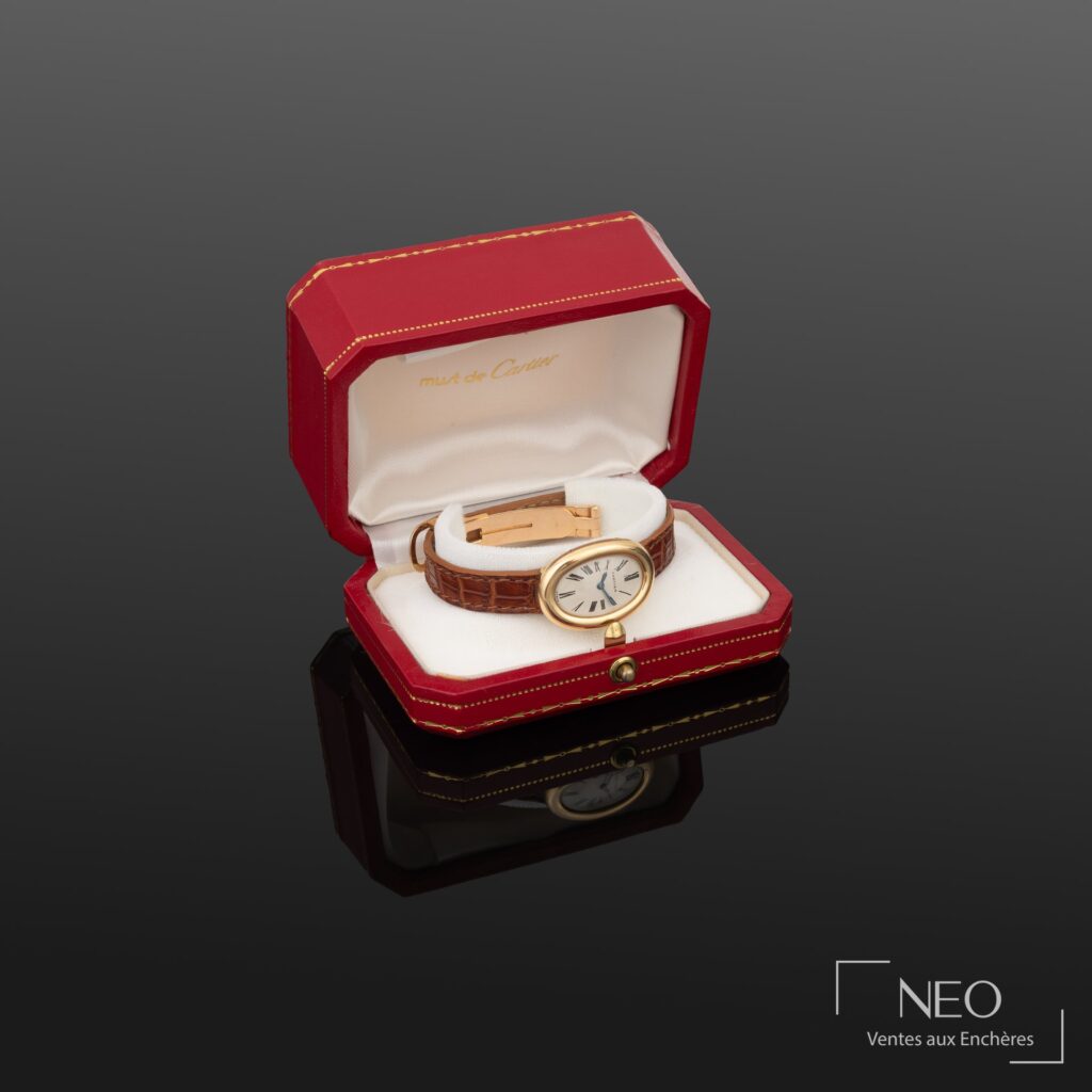 Montre Cartier Baignoire Duoplan dans son écrin rouge signé
