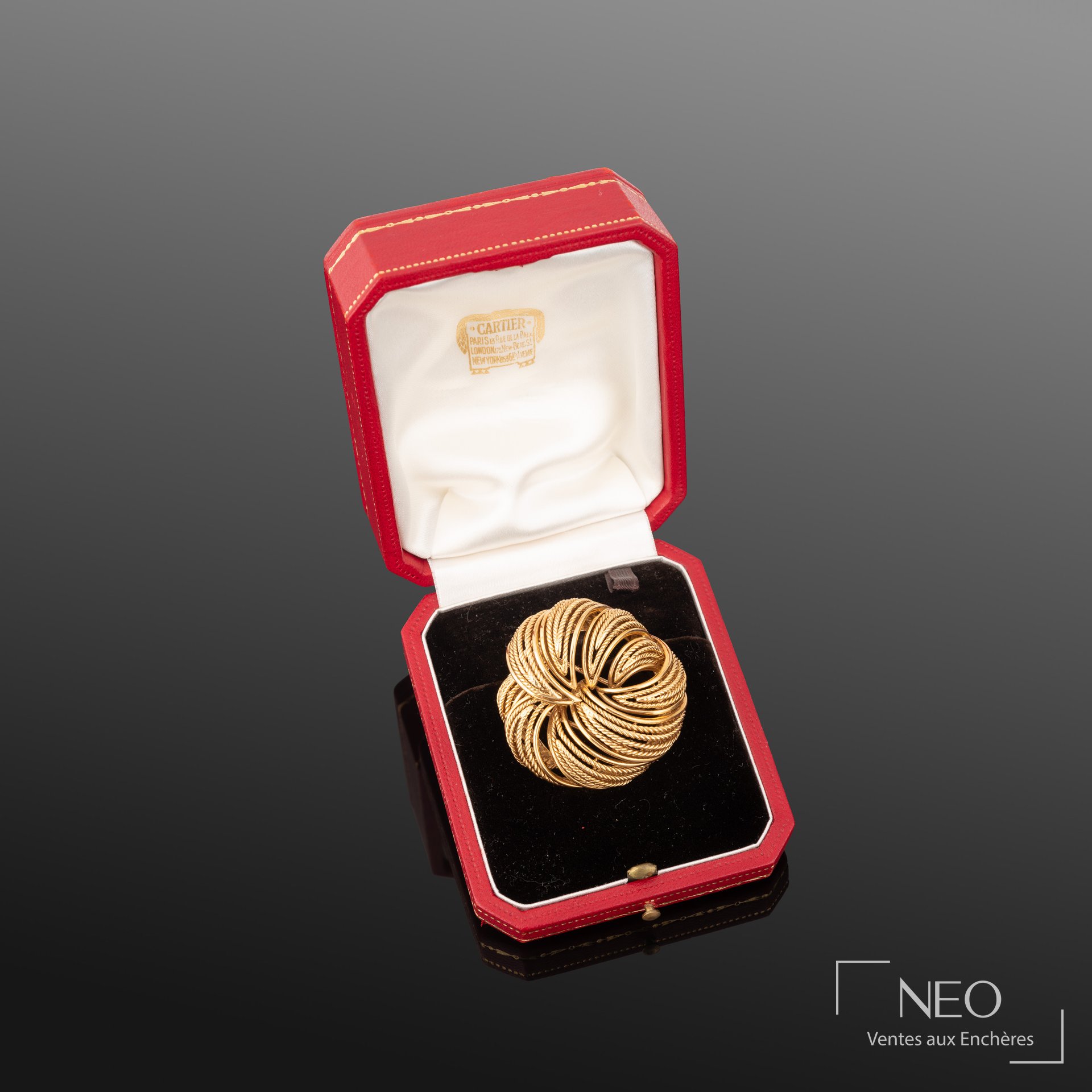 Cartier Paris broche ronde en or jaune 18K, époque moderne