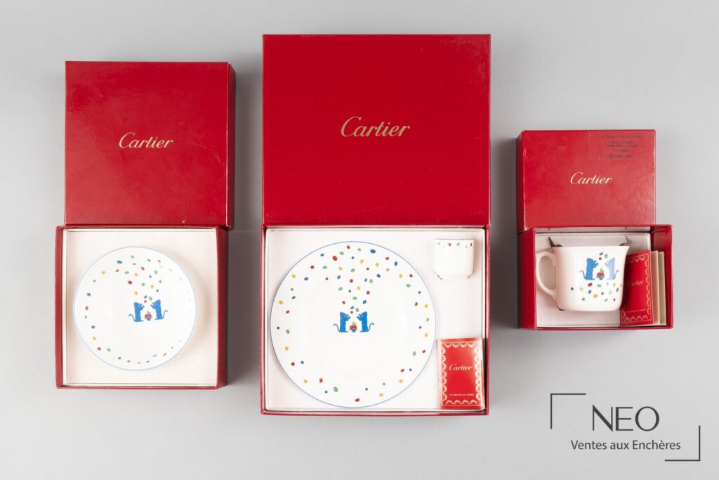 Ensemble Cartier dans ses écrins rouges