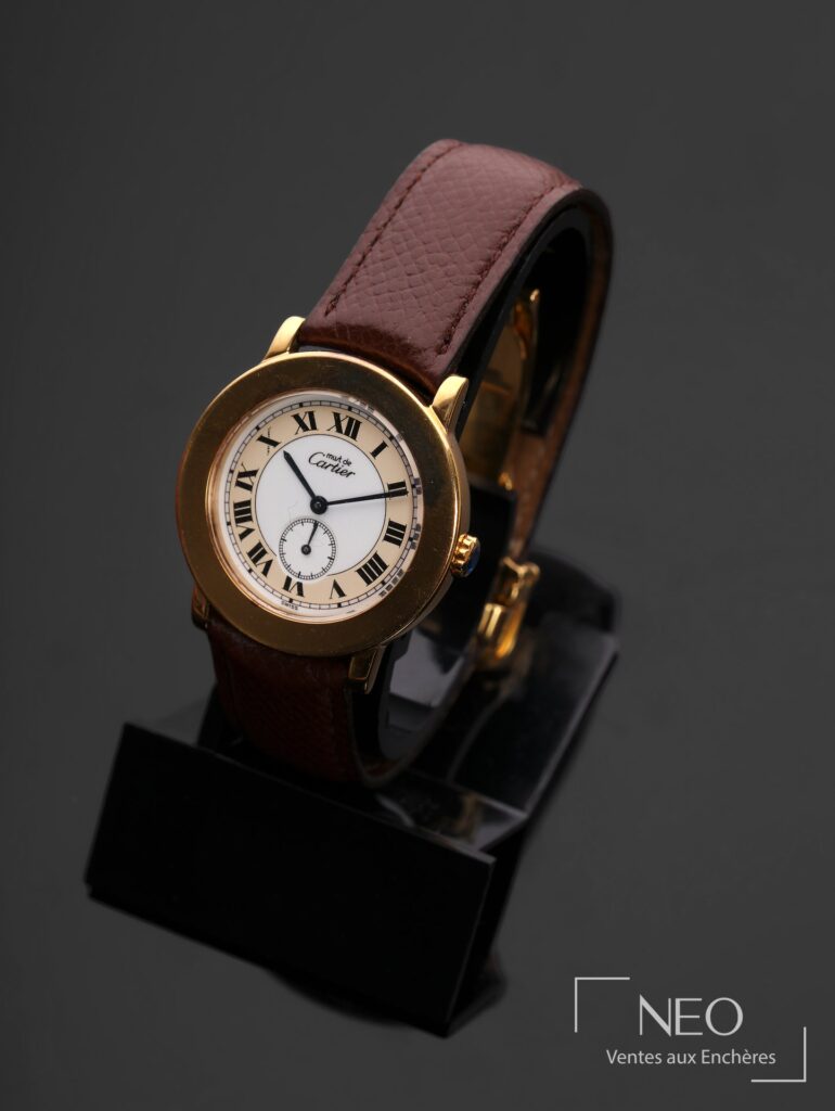 Montre Cartier Must ronde en plaqué or sur support