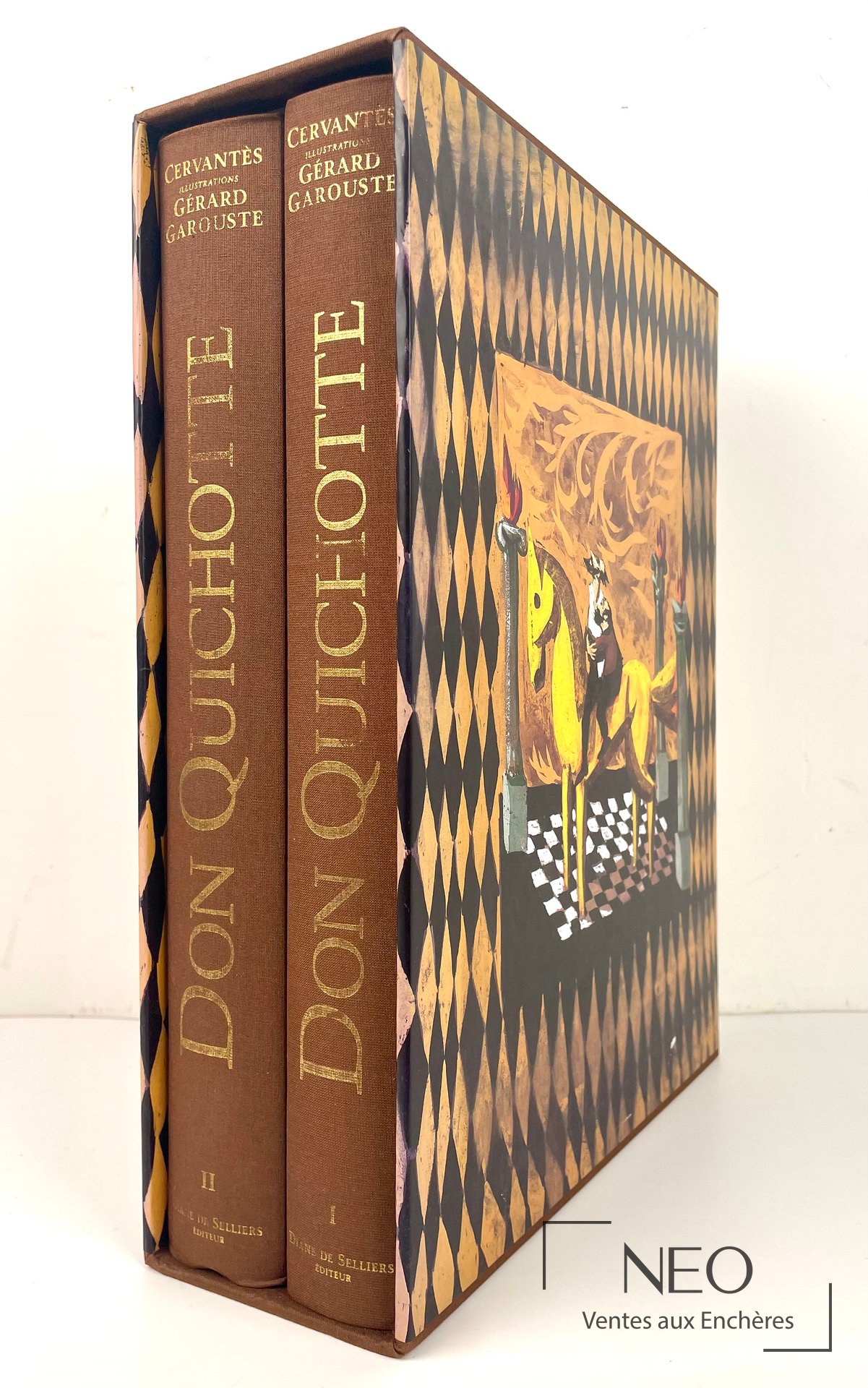 Deux volumes Don Quichotte de Cervantes dans leur coffret illustré