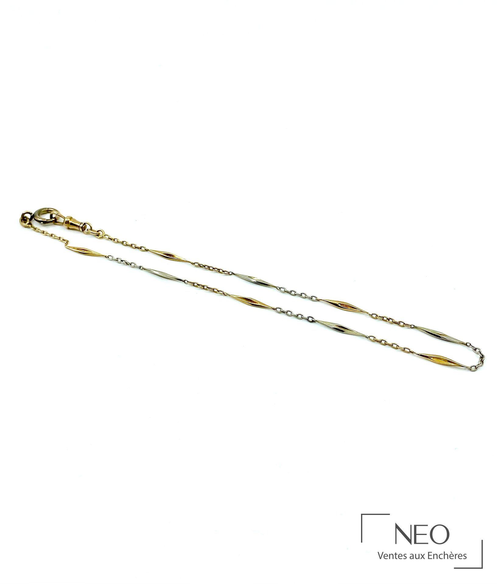 Chaîne en ors jaune et gris 18 carats à maillons losangés fantaisie