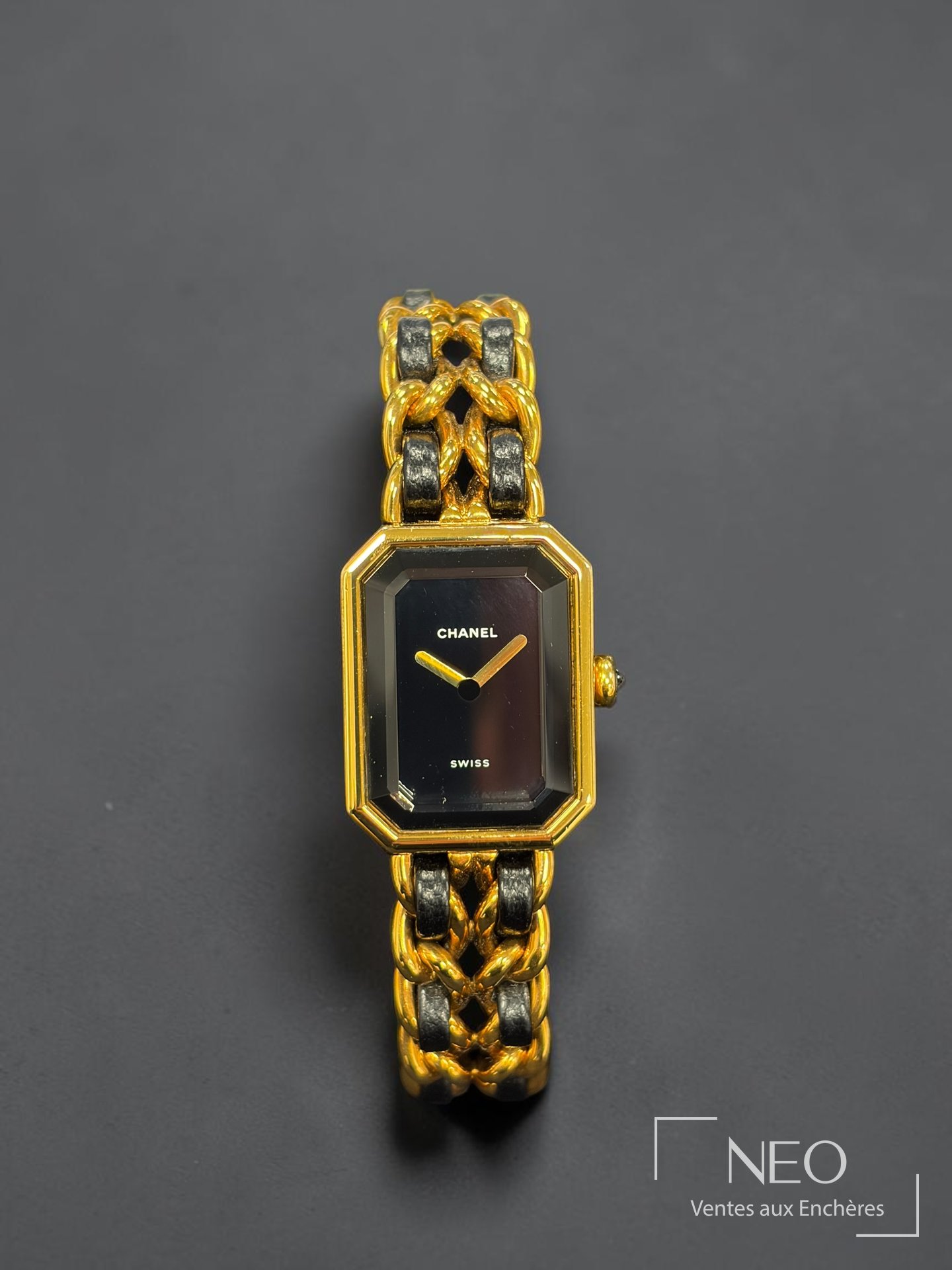 Montre CHANEL Première au cadran noir et bracelet chaîne bicolore