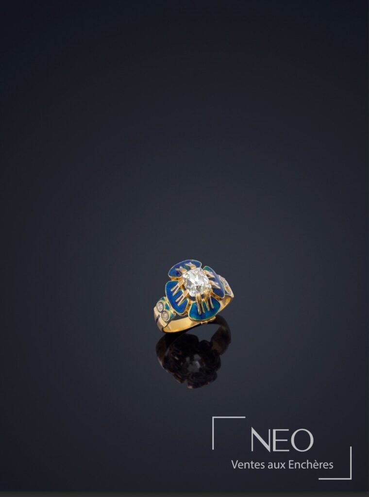 Bague Pensée de Charles Rivaud avec diamant central et pétales émaillés bleus