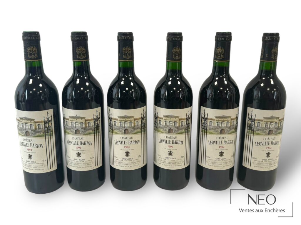 Six bouteilles de Château Léoville Barton 1992 alignées de face