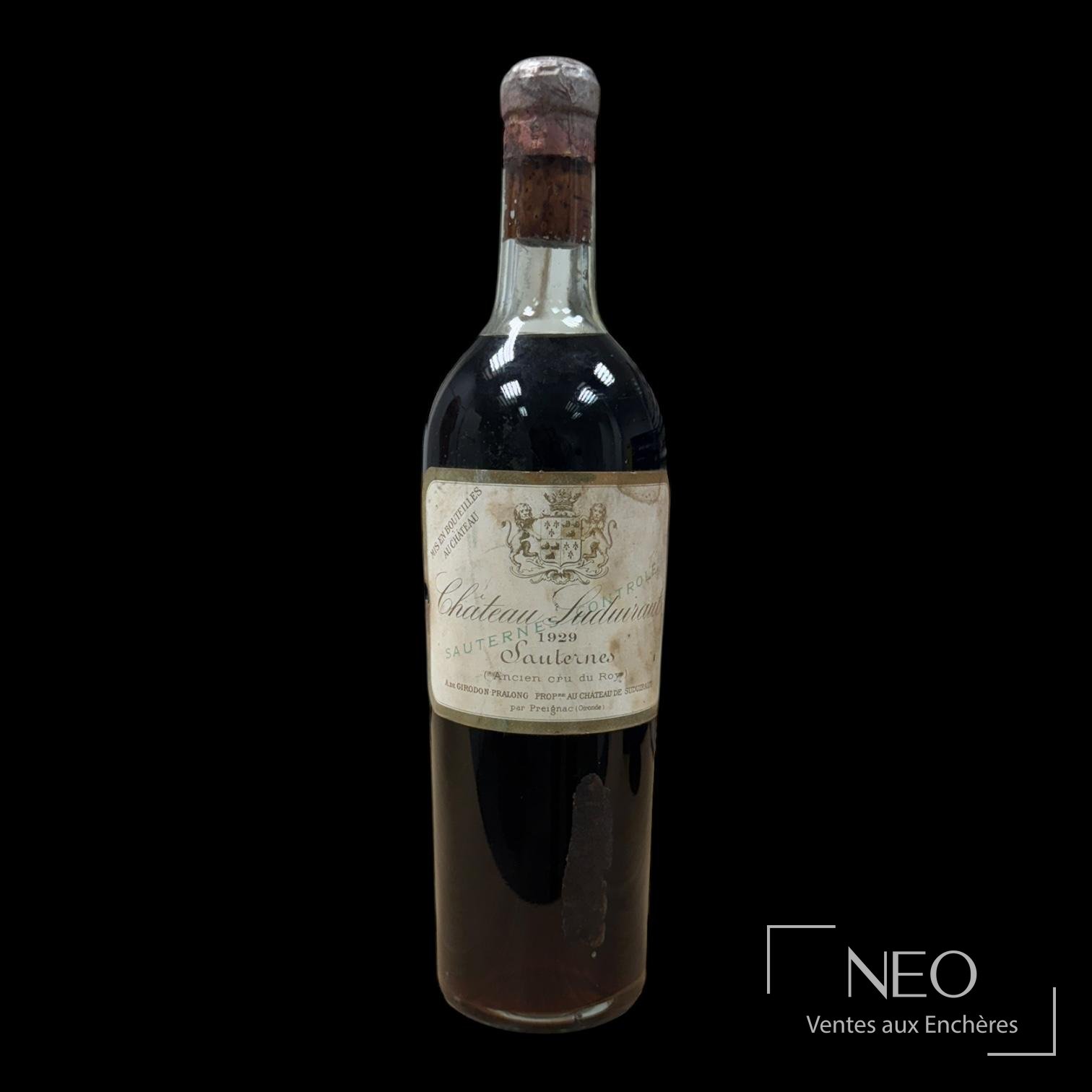 Bouteille de Sauternes Château Suduiraut 1929 avec étiquette visible