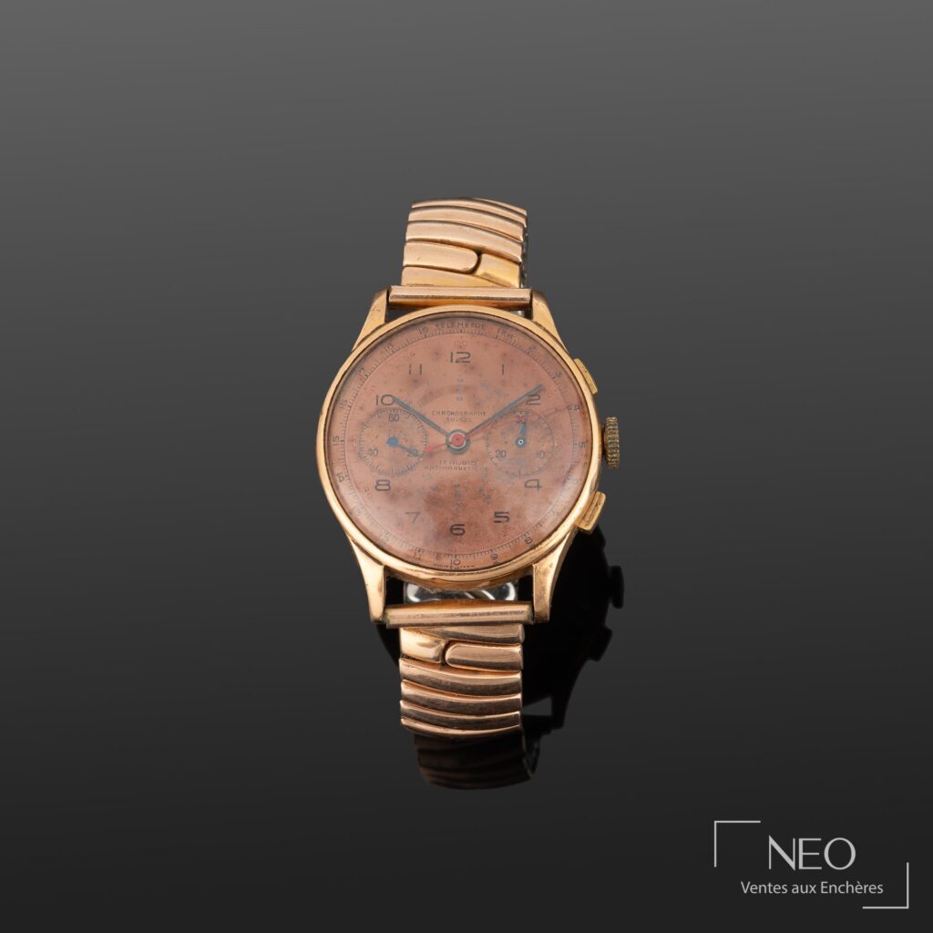 Montre chronographe suisse en or jaune et acier