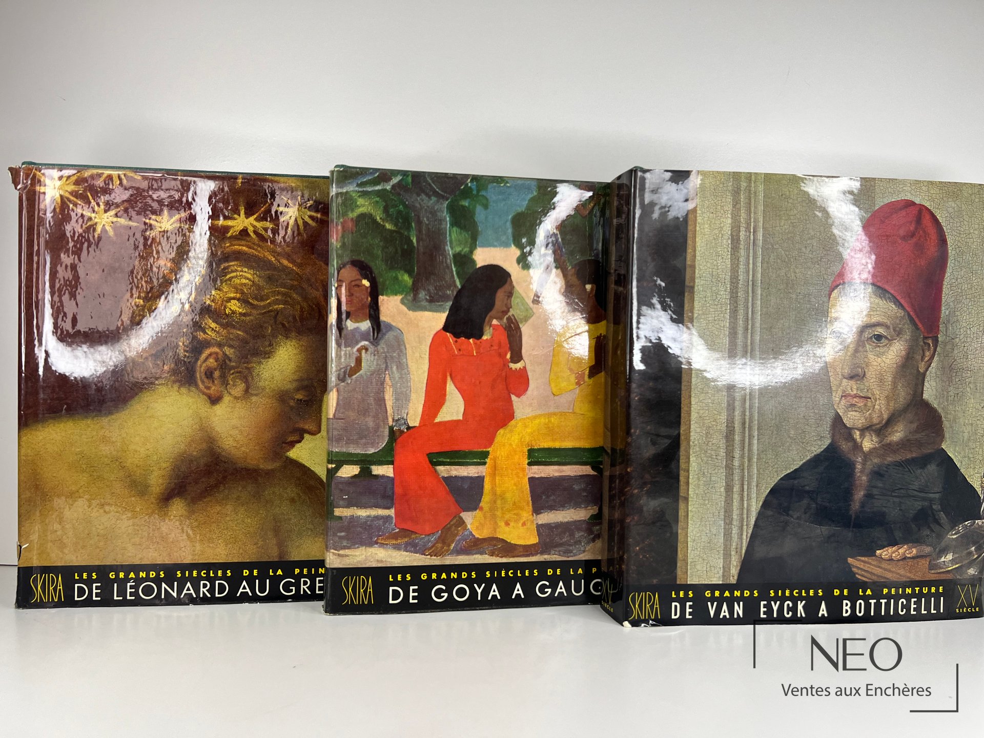 Trois volumes illustrés Les Grands siècles de la Peinture de Skira alignés de face
